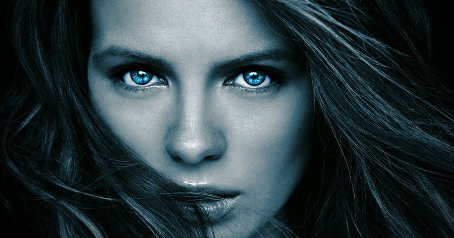 Kate Beckinsale's close-up portrait with the characteristic blue eyes of Underworld's vampires. Image Source: Movie Web
