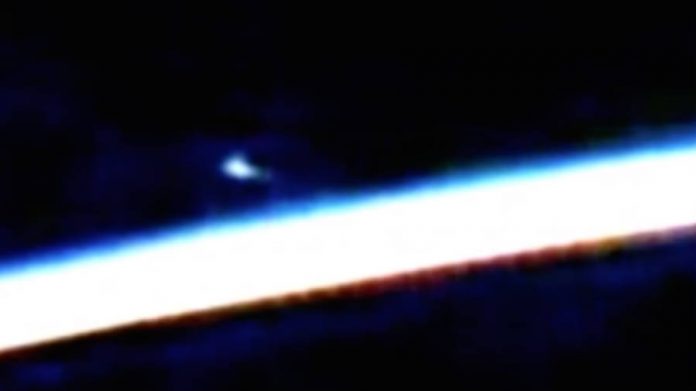 ISS captures UFO hovering Earth.