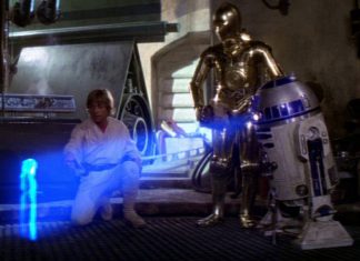 Luke-Skywalker-and-C-3PO-watch-R2-D2-display-a-hologram-of-Princess-Leia-in-Star-Wars-A-New-Hope