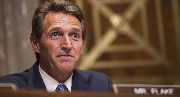 Senator Jeff Flake files a resolution on Tuesday to repeal a set of rules approved last October by the FCC