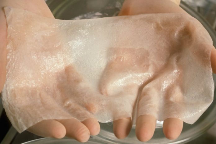 scientists-hands-hold-artificial-skin-825x550