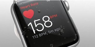 Apple Watch 2 with the heart rate app on screen.