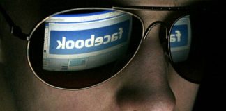 Facebook logo reflected on shades