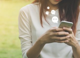 Woman Using Live Chat on Mobile Phone